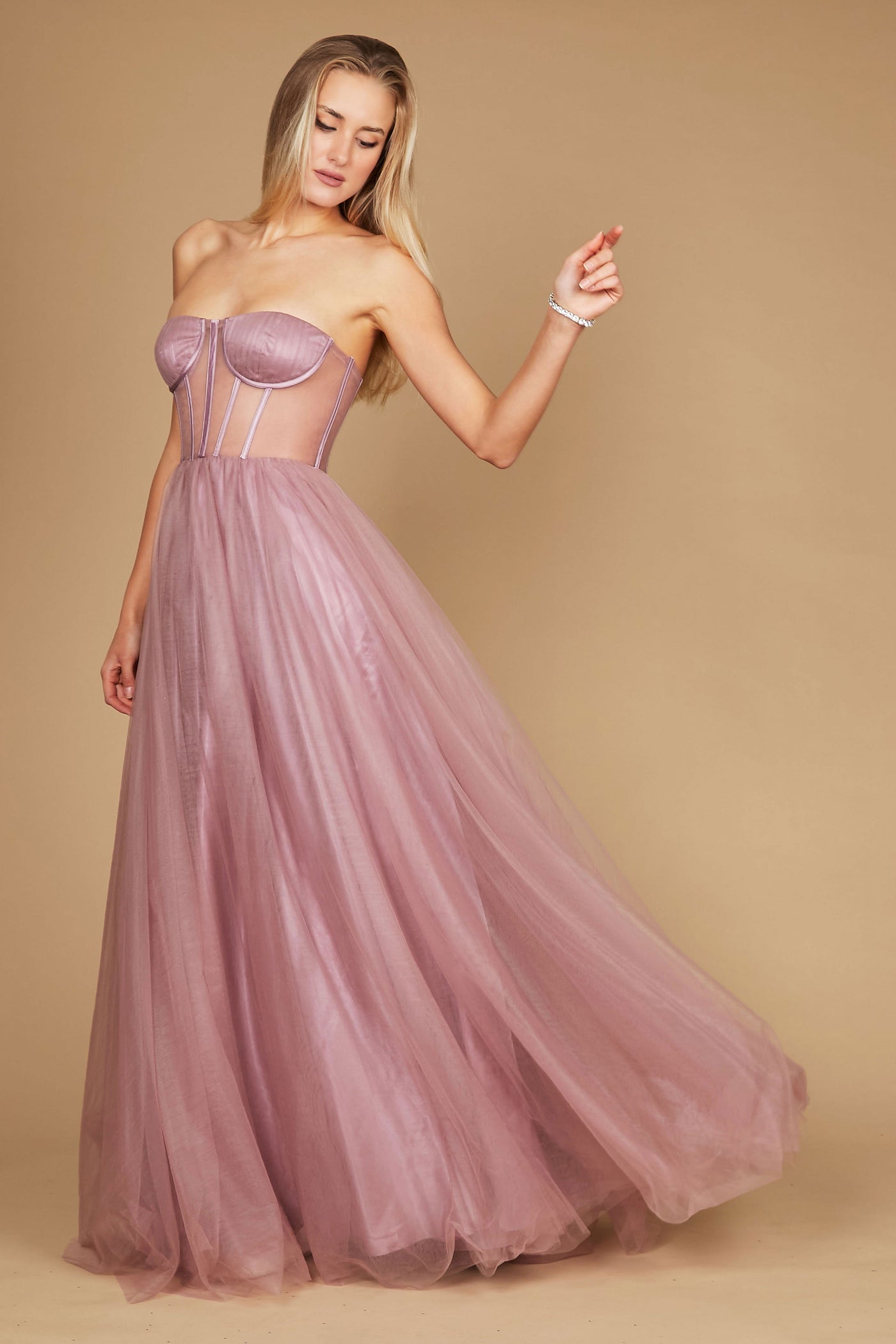 A stunning mauve corset prom party dress featuring intricate detailing, designed for formal occasions, with a flowing ball gown silhouette that exudes elegance and sophistication.