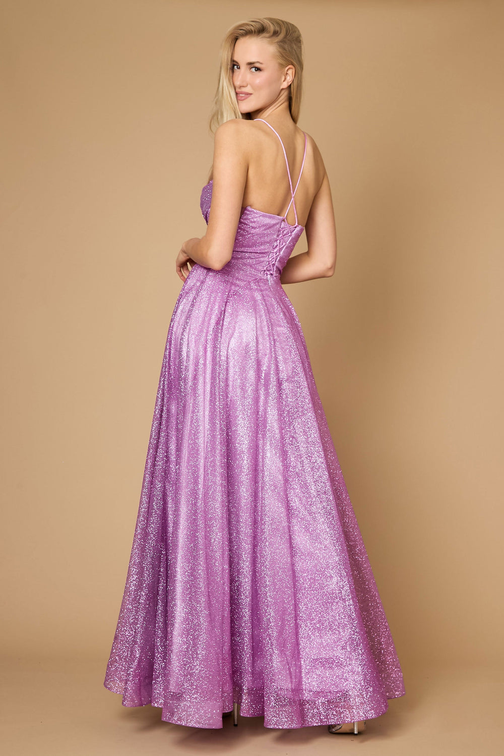 A stunning mauve prom dress featuring a long, sparkling cowl neckline and a fitted corset bodice, elegantly flowing into a full skirt that shimmers with every movement.