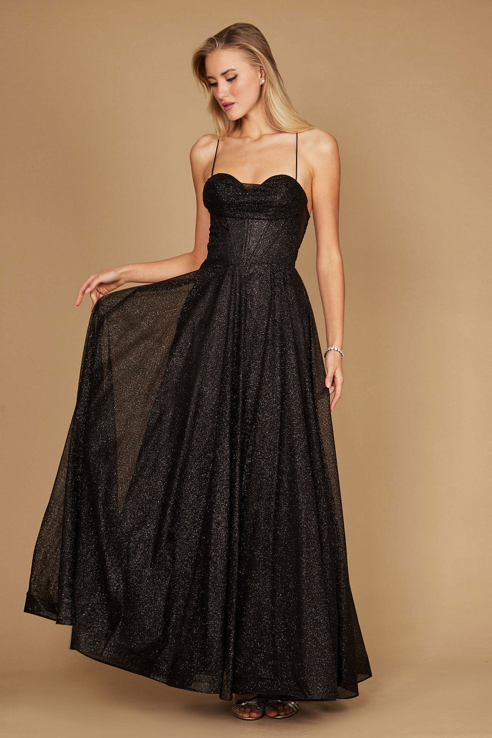 A stunning black prom dress featuring a long, sparkling cowl neckline and a fitted corset bodice, elegantly flowing into a full skirt that shimmers with every movement.