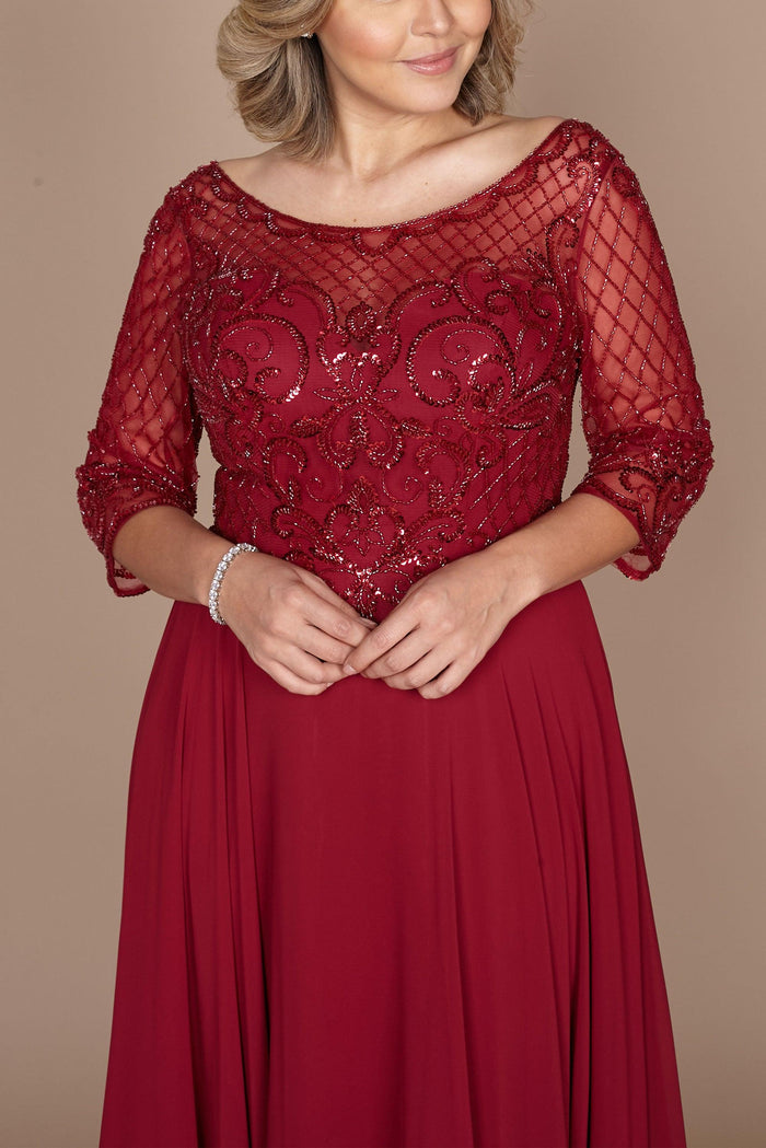 Elegant long sleeve mother of the bride dress in rich burgundy, adorned with intricate hand-beaded detailing, showcasing a sophisticated silhouette perfect for a formal wedding.