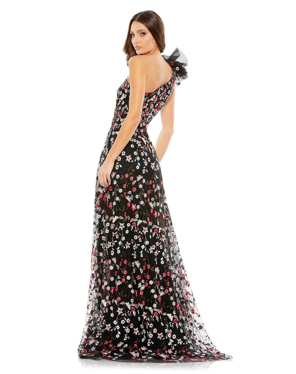 A woman in a Mac Duggal 20331 Long One Shoulder Floral Dress with red and white flowers.