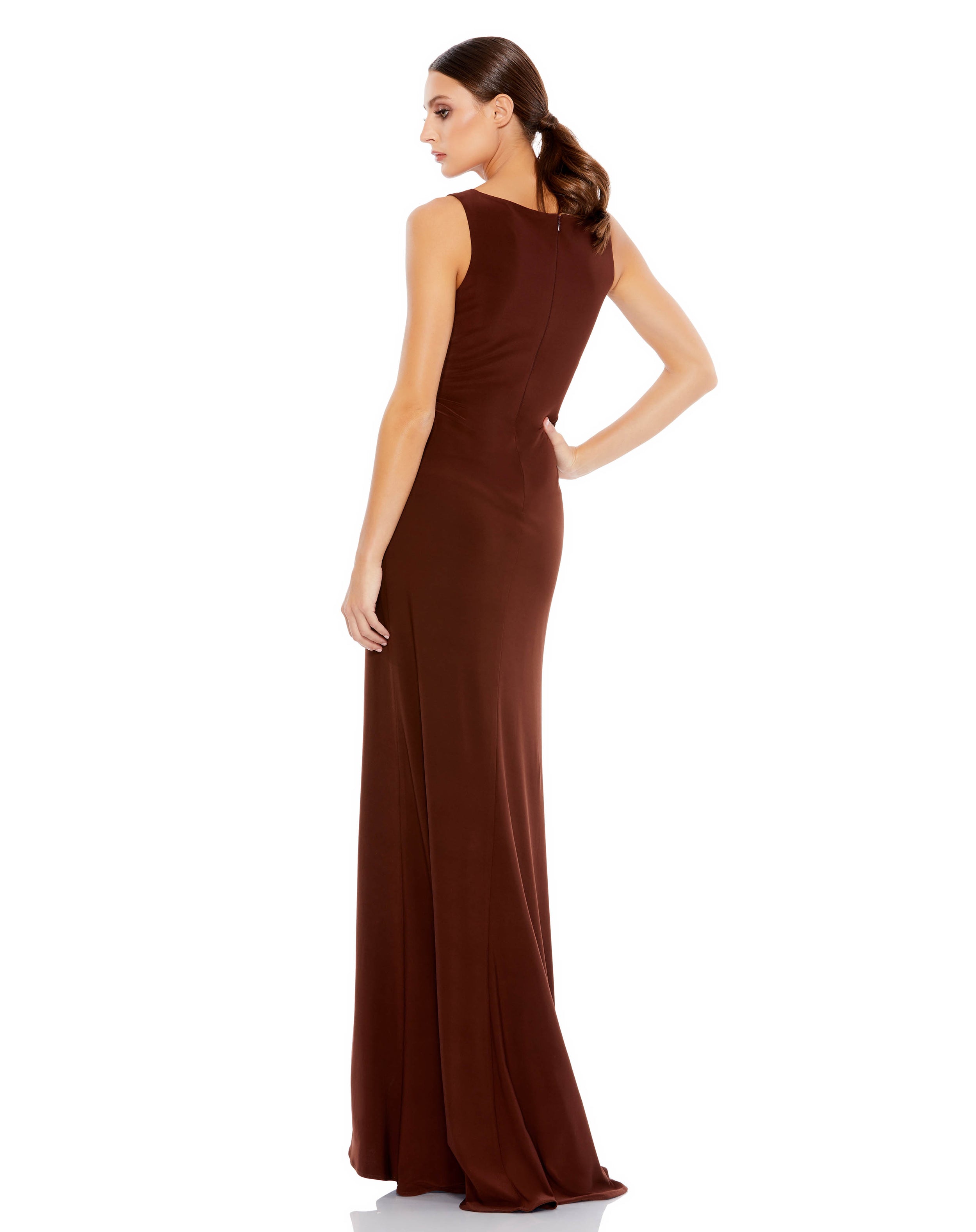 The back view of a woman wearing a Mac Duggal 26513 Prom Long Sleeveless Formal Dress.