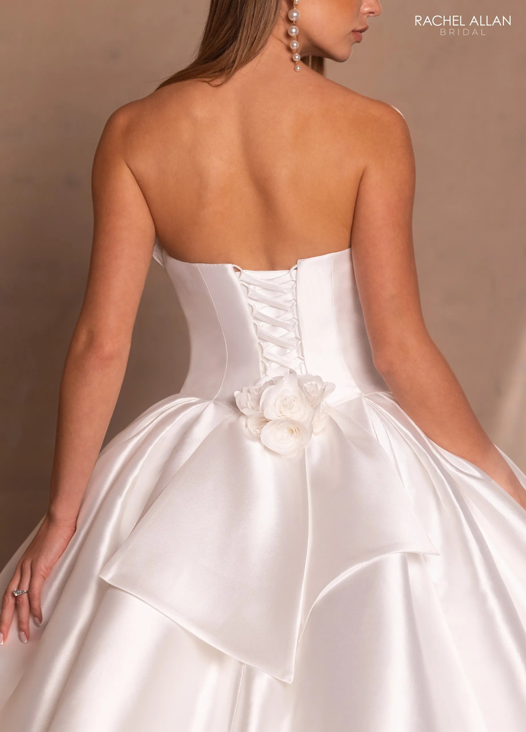 Ivory Strapless Floor-Length Satin Bridal Ball Gown with Bow Bodice and Floral Detail Rachel Allan RB6175