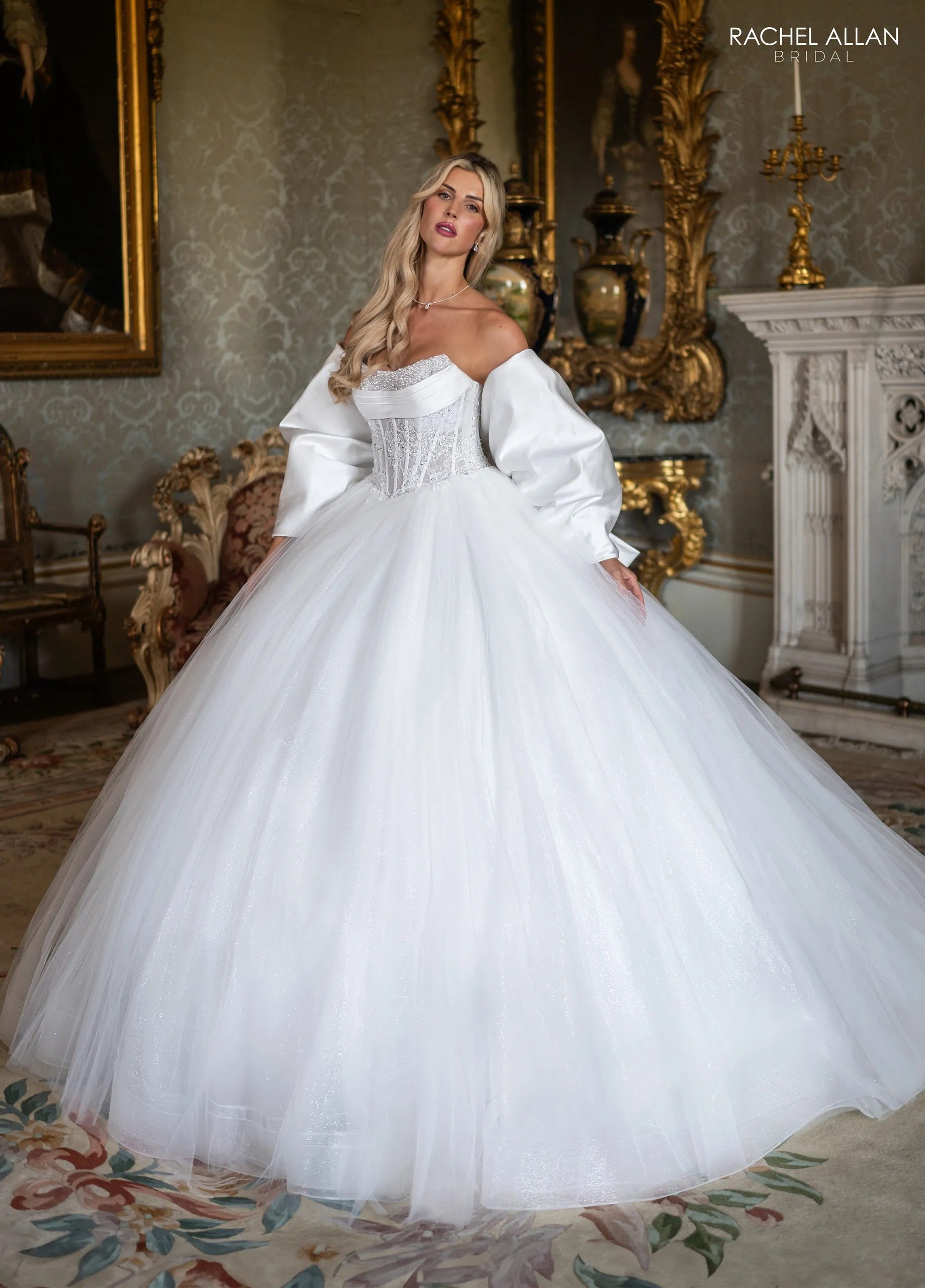 modern architectural wedding dress From the architectural drape of the off-the-shoulder sleeves to that breathtaking corset back detail, this gown is a masterclass in modern romance. Its for the bride who wants the royal treatment