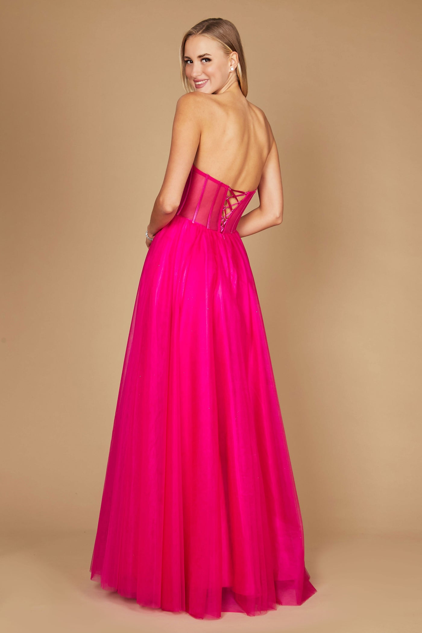 A stunning fuchsia corset prom party dress featuring intricate detailing, designed for formal occasions, with a flowing ball gown silhouette that exudes elegance and sophistication.