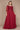 Elegant long sleeve mother of the bride dress in rich burgundy, adorned with intricate hand-beaded detailing, showcasing a sophisticated silhouette perfect for a formal wedding.